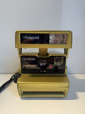 Polaroid OneStep AF camera, gold, for parts or repair