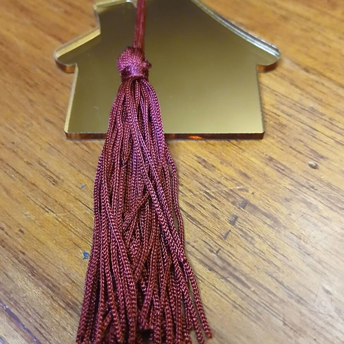 House-shaped plexiglass mirror charm new with burgundy tassel