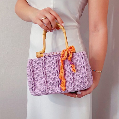 Handmade lilac crochet handbag with wooden handles and eco leather base