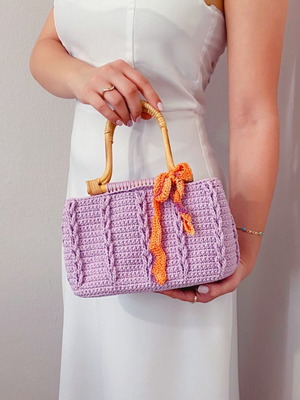 Handmade lilac crochet handbag with wooden handles and eco leather base