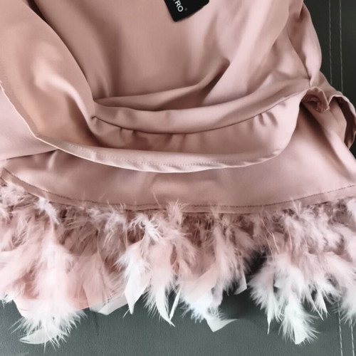 Upcycled asymmetric skirt with ruffles and pink feathers, SBETRO