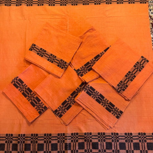 Handwoven tablecloth and napkin set from grandmother's loom