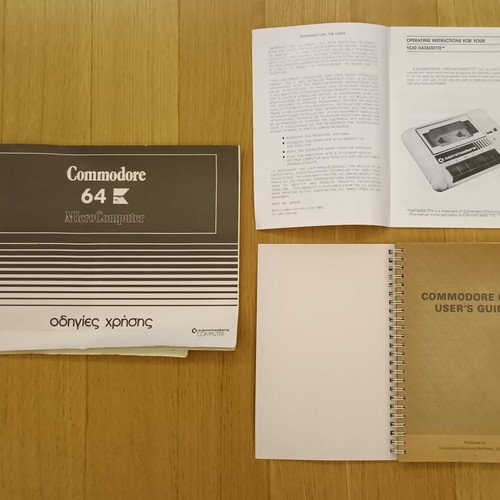 Commodore 64C used with original power supply, cassette player, and manuals