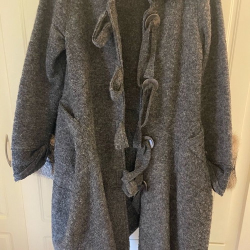 Long coat used with large buttons