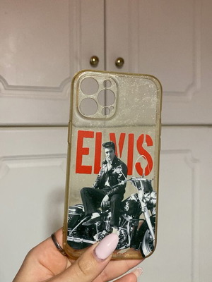 Elvis clear phone case with glitter used