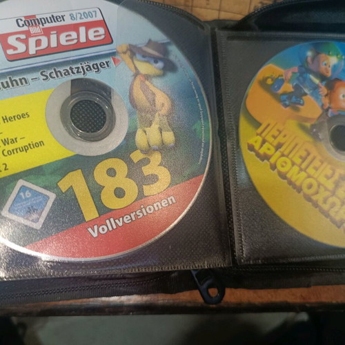 Case with various PC games and demos used