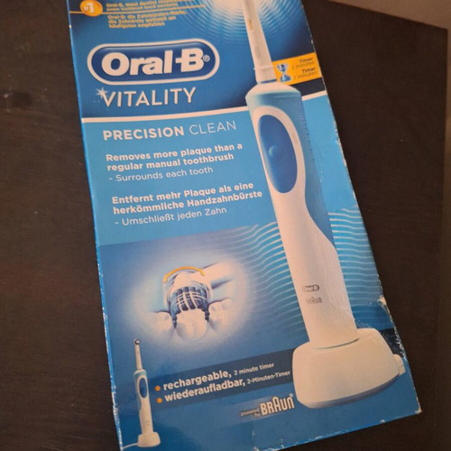 Oral-B Vitality electric toothbrush used