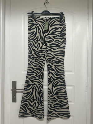 H&M Animal Print Flared Pants New With Shiny Thread