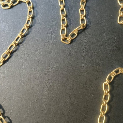 Long steel necklace chain like new, gold tone