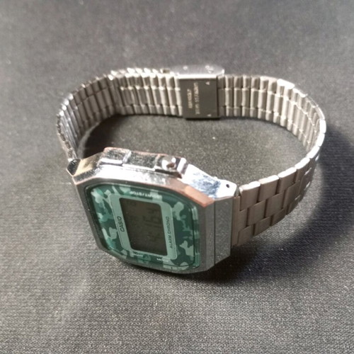 Casio 3298 used, green and silver