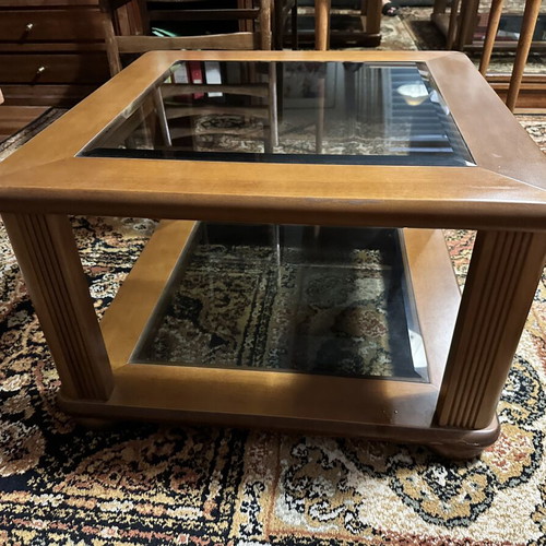 Set of two wooden square coffee tables with glass tops