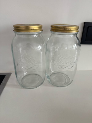 Quattro Stagioni Glass Storage Jars set of 2 like new