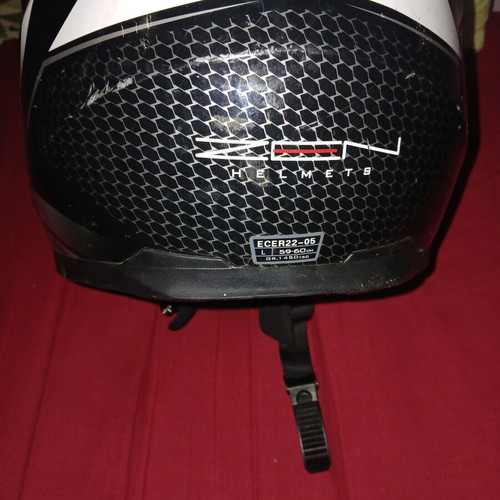 Helmet used, front visor damaged