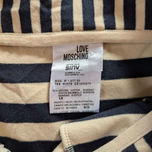 Love Moschino mini skirt used, size large, beige and black