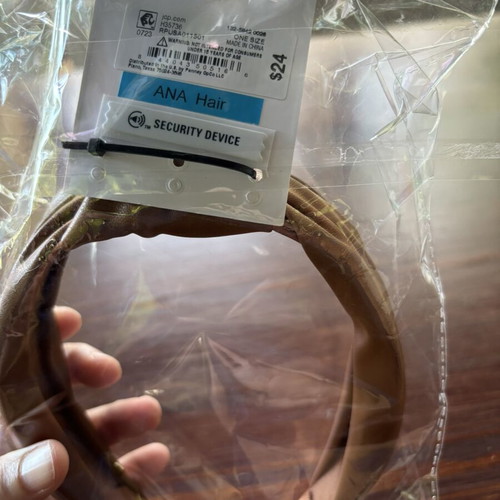 Headband new, brown leatherette