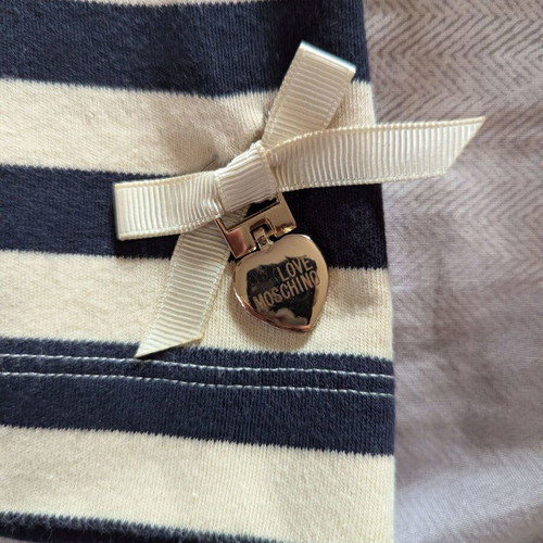 Love Moschino mini skirt used, size large, beige and black