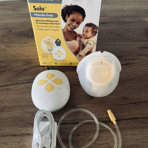 Medela Solo Hands-free electric breast pump and Philips Avent 3-in-1 sterilizer set