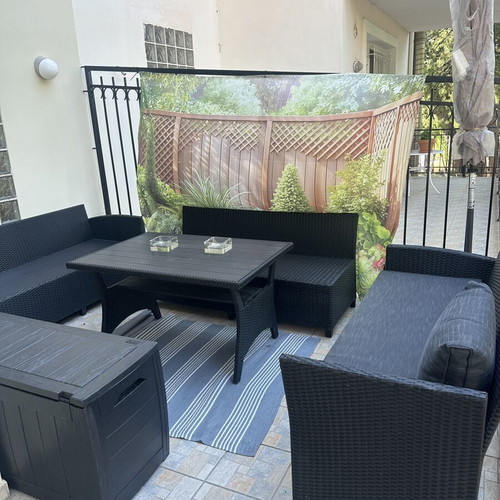 Outdoor garden sofa set like new, U-shaped with storage and table