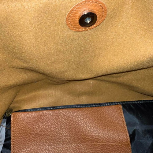 Brown shoulder bag with flap used