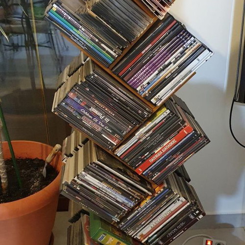 CD/DVD tower used, wooden rotating, black color