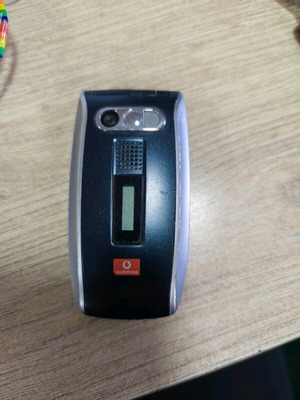 Sharp GX25 used, without battery and charger