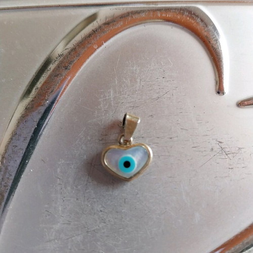 Silver heart 925 with evil eye used, gold color