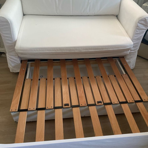 IKEA HAGALUND two-seater sofa bed, white