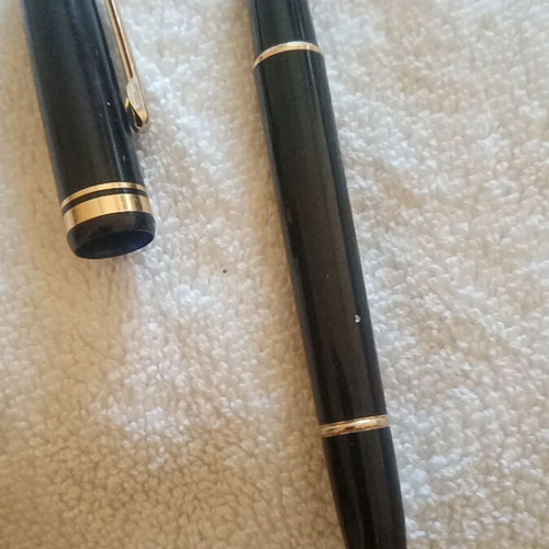 Black pen gold shiny like new