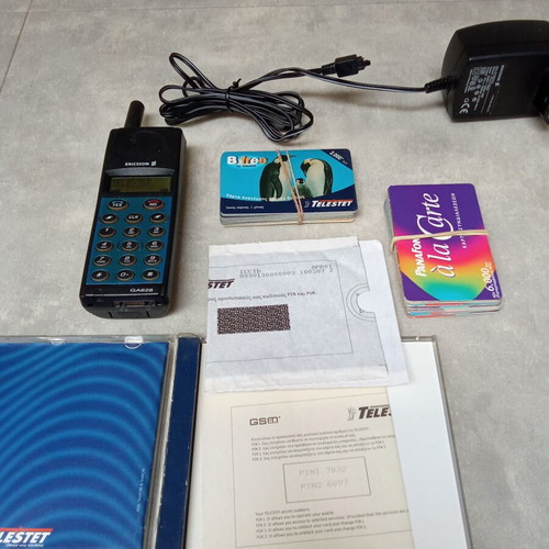 Ericsson GA 628 mobile phone used, vintage collectible with charger and cards
