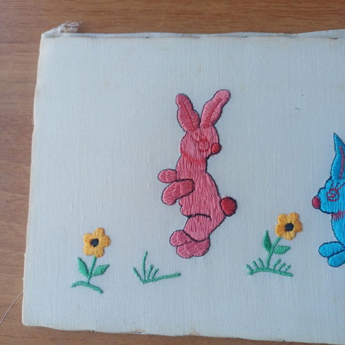 Vintage embroidery with rabbits like new, colorful spring design