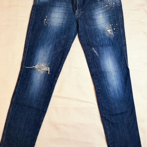 Vintage blue Rococo jeans with studs and rips like new