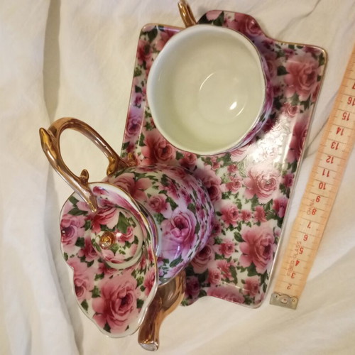 Vintage individual tea set porcelain with gold trim and roses like new