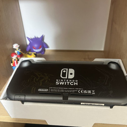Nintendo Switch Lite Palkia Dialga like new with accessories and 2 protective cases