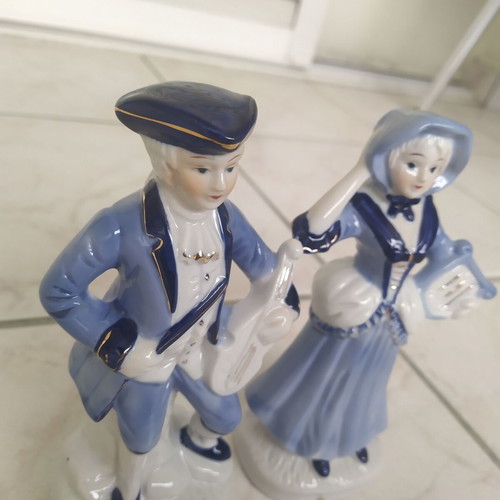 Vintage musical couple figurine with blue clothes like new
