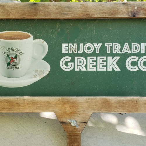 Wooden Lumidis entrance sign used, promotional