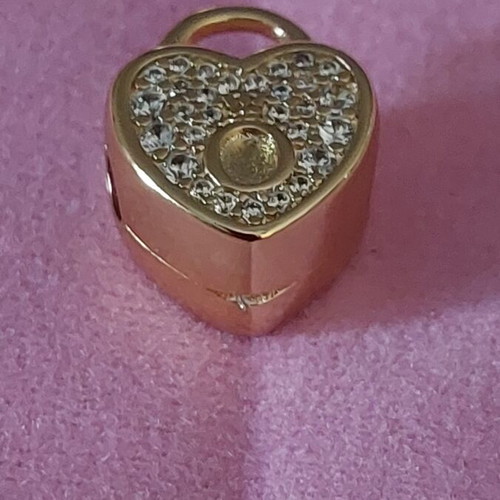 Charm stopper heart new, gold color with white zirconia and Pandora logo