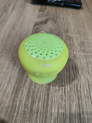 Portable Bluetooth speaker with suction cup used
