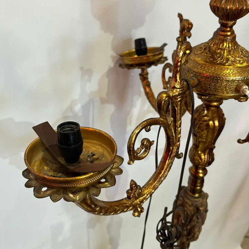 Vintage brass floor lamp with ornate baroque designs used