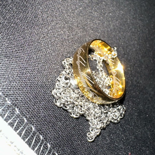 Lord of the Rings ring with chain like new, gold and silver