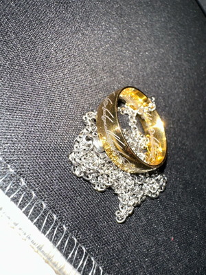 Lord of the Rings ring with chain like new, gold and silver