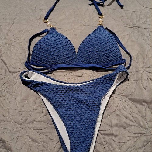 Navy blue bikini like new with embossed design and decorative pearls size S