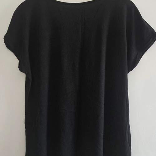 Black blouse with subtle chest design, size Large/Extra Large