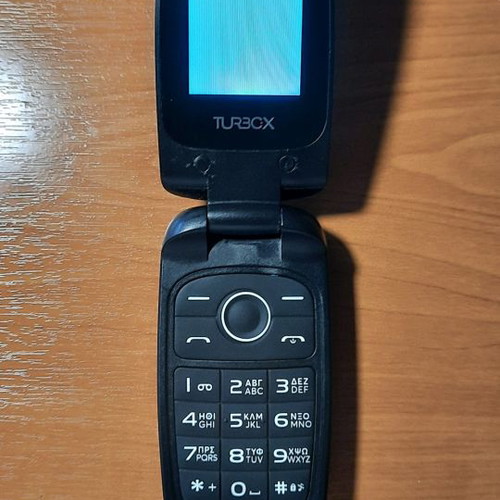 TurboX MiniFlip II small mobile phone with defect