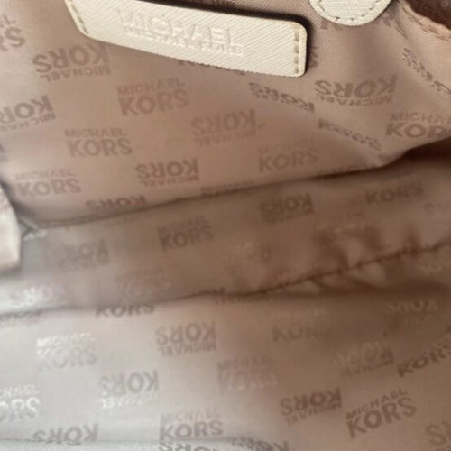 Michael Kors white tote bag with floral and dragonfly details