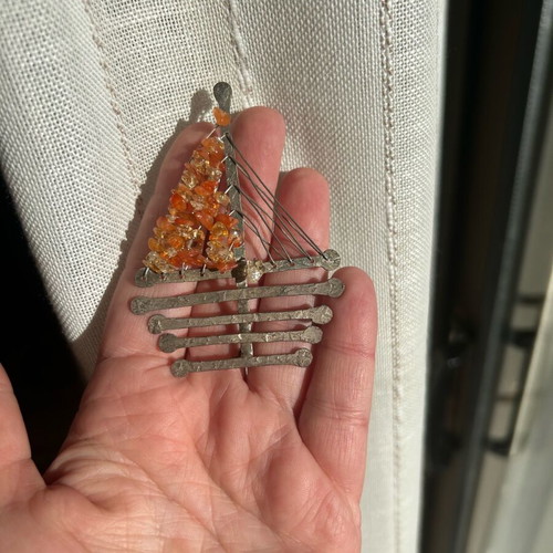Women's brooch ship-shaped silver with orange stones like new