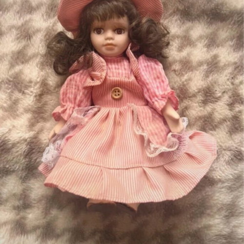 Porcelain doll vintage like new, about 20cm