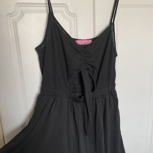 Pink Woman short romper with front opening like new, black