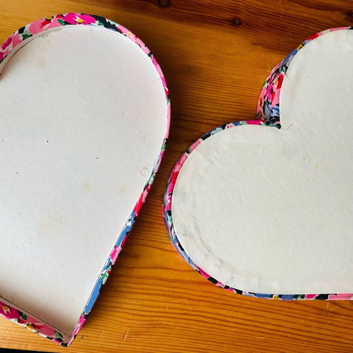 Heart-shaped gift box used with flowers, paper covered with fabric