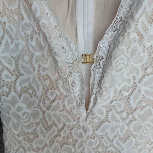 Lace jumpsuit like new, white and beige, with gold clasp