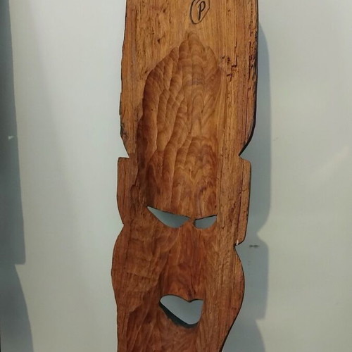 Pair of large handmade African masks from solid wood like new